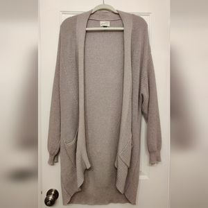 Cardigan. Large size. Tan color.